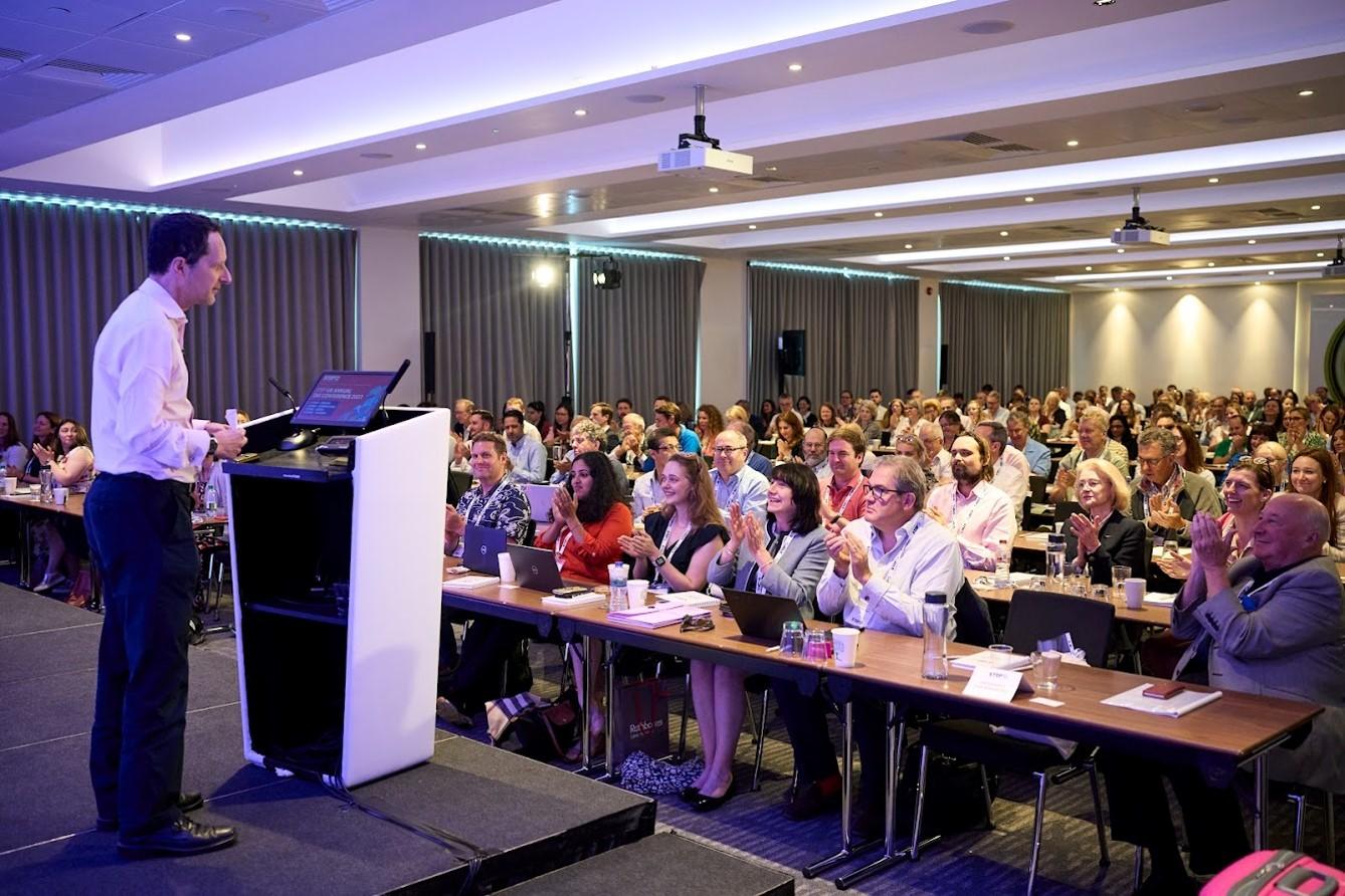 Speaker presenting to audience